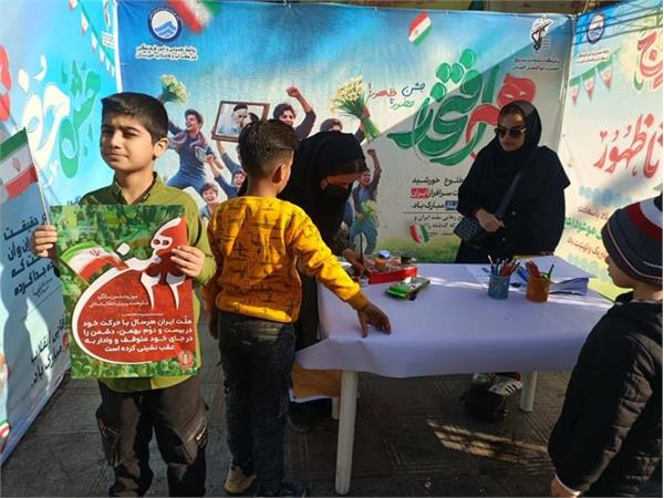 برگزاری غرفه شرکت آب و فاضلاب خوزستان در راستای ترویج مصرف صحیح آب در مسیر راهپیمایی مناسبت ۲۲ بهمن